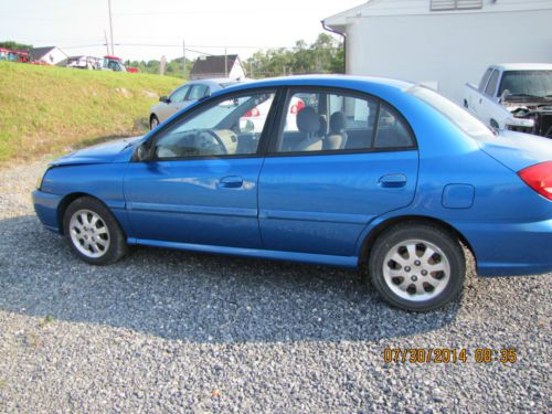 2004 kia rio 4 dr sedan light front damage, rebuildable, wrecked, damaged