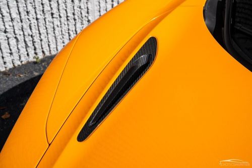 2020 mclaren 720s performace w/ a $354,970 msrp in mso papaya spark