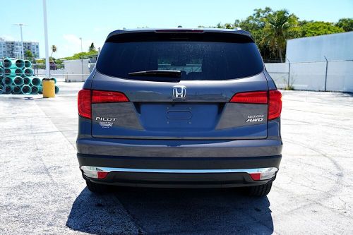 2018 honda pilot free delivery! touring awd w/ 33k miles. call 786-328-3187