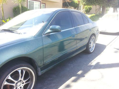 2001 4door green, with nice siver rims