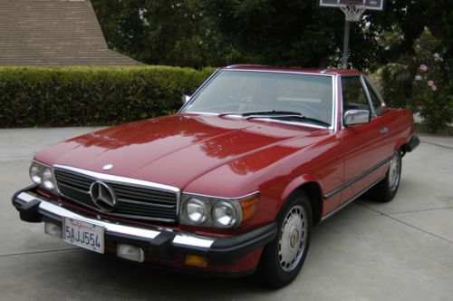 1989 mercedes benz 560sl w/ hardtop 125,643 mi. red with tan interior