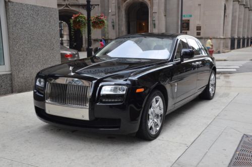 2010 rolls royce ghost.  diamond black with creme light.