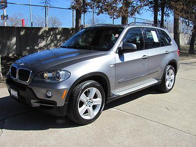 2009 bmw x5 3.0 silver panaramic gps/nav warranty boards roof leather we finance