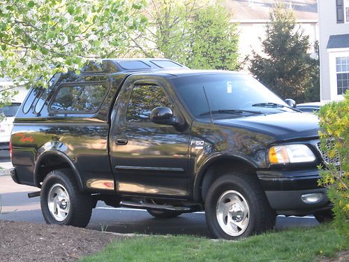 1999 ford f-150  xlt v8 w/ high cap 4x4  black super clean!!!!! low reserve!!