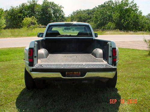 2002 dually 2wd  ho 5.9l  turbo diesel 6sp 63k 1 owner miles low reserve