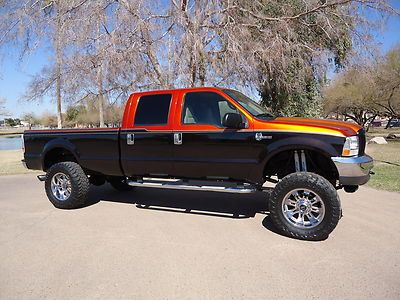 2002 ford f-250 ---- 134k miles----- 7.3 diesel --- 4x4 -- lifted custom --