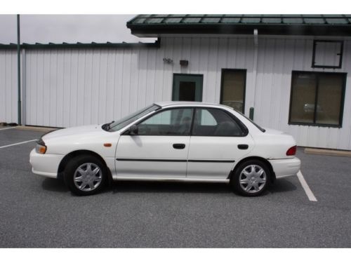 98 subaru impreza l 5 speed manual 4-door sedan no reserve non smoker cd a/c