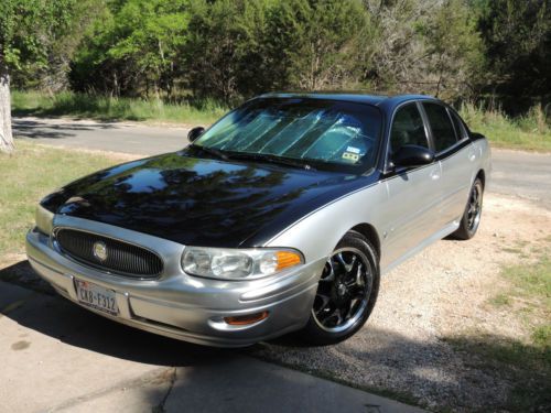 Fully loaded, 2tone custom paint black/silver. black/grey leather interior, rims