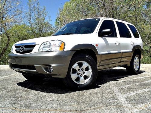 Mint! &#039;03 mazda tribute one owner! lo miles! clean carfax! cd changer roof rack!