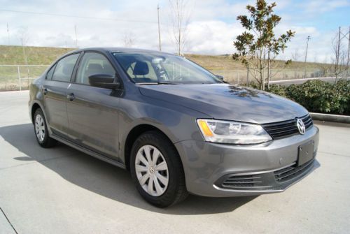 2013 volkswagen jetta s. 5-speed manual. 13k miles. awesome car, good economy1