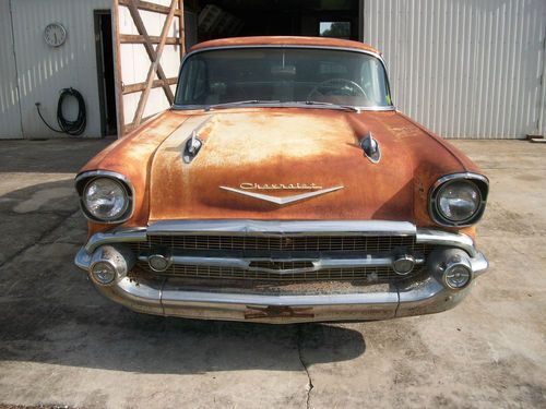 1957 chevy 4 door hard top, power pack car, all original, number matching