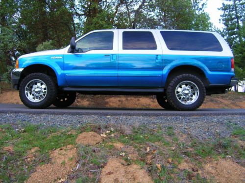 Custom candy blue paint lift 20&#034; wheels 35&#034; toyo mt&#039;s low miles super clean