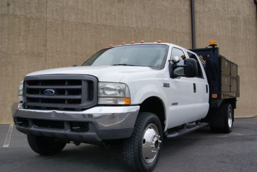 2004 ford f-450 quad cab - 4x4 - stake body *low miles*turbo diesel - no reserve