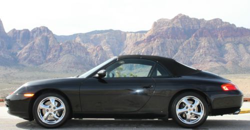 Black w/low miles porsche 911 carrera convertible