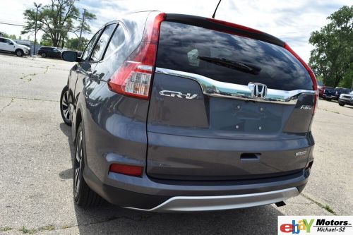 2015 honda cr-v awd touring-edition(top of the line)