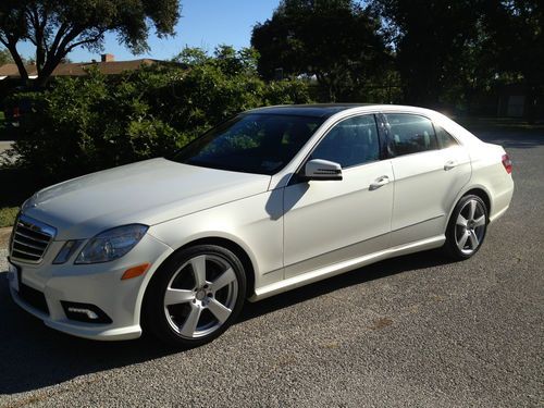 2011 mercedes e-350 4-matic, white/black interior. panoramic roof,navigation