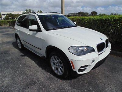 2011 bmw x5 3.5l,awd,warranty,1-owner,carfax certified,navi,third row seat,no re