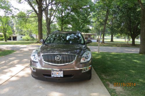 71,000 miles brown enclave with new tires in sunroof, cd player, seating for 8