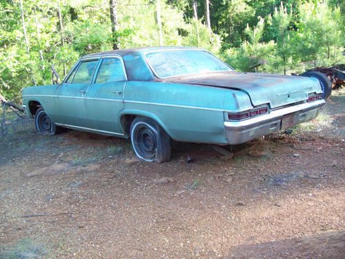 1966 impala 4 door,no motor or transmission.no title,air ps car,parts or restore