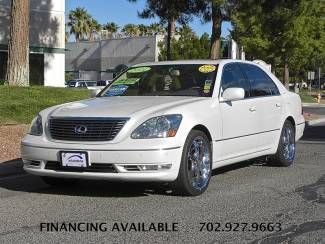 Low miles 79k**pearl white**navigation**chrome wheels**shipping quotes available