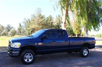 Extra clean 5.9 liter cummins diesel long bed 4x4 with bedliner - we finance