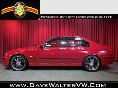 M5 4dr sdn 6 manual 5.0l cd 4-wheel disc brakes abs adjustable steering wheel