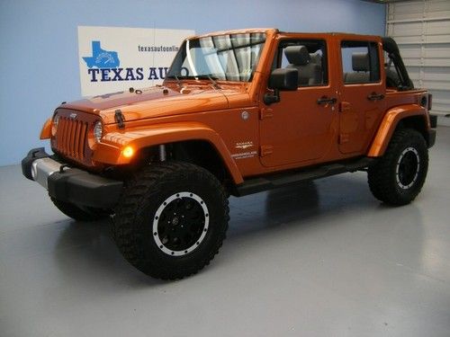 We finance!!!  2010 jeep wrangler unlimited sahara 4x4 auto hard top nav lift cd