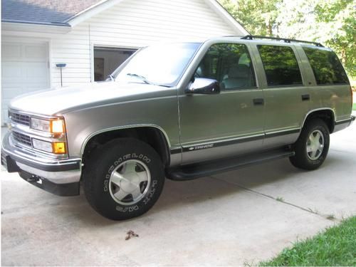 1999 chevrolet tahoe lt  5.7l 4 wheel drive rare 3 row seats.