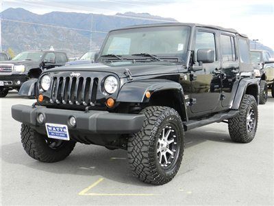 Unlimited sahara 4 door 4x4 custom lift wheels tires auto tow off road soft top