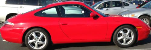 Red porsce 911 carrera in mint condition, low miles, 6 speed manual