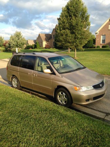 2001 honda odyssey gold cloth seats -good condition