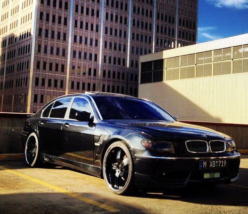 Bmw 745li blacked out w/body kit 22" wheels