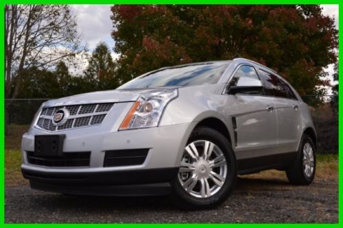 Heated leather seats heated steering wheel power liftgate xenon lights save