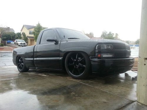 2002 chevrolet silverado show truck bagged shaved &amp; murdered out! must see!!!