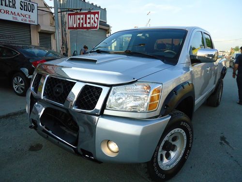 2004 nissan titan 5.6 se full crew cab salvage repairable runs drives no reserve