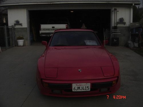 Red 1985 porsche 944