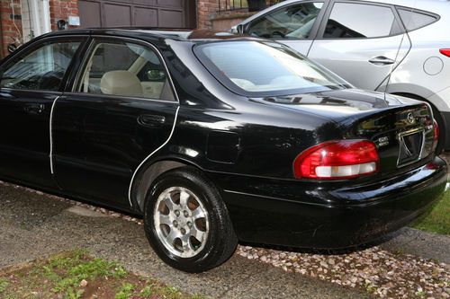 1999 mazda 626 lx sedan 4-door 2.5l