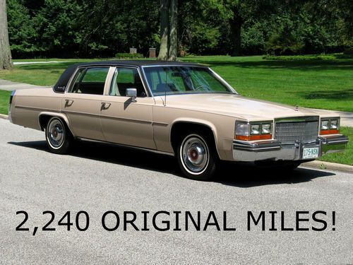 2,240 original miles! * 6.0 liter v-8 * sandstone * collector cadillac * bid now