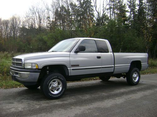 *dodge cummins lariane slt 2500 ext.cab 4x4 stock drivetrain runs  good loaded *