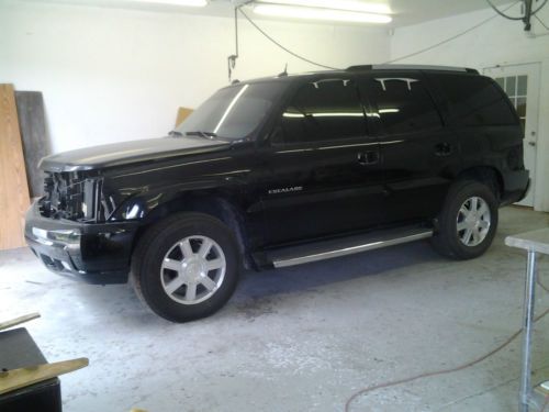 Cadillac escalade needs body work