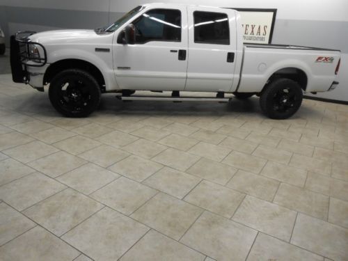 06 f250 lariat fx4 4x4 crew heated seats leather diesel we finance texas