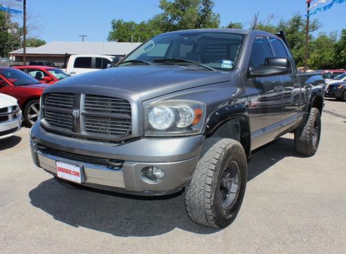 5.9l i6 diesel laramie leather power seat off road tires lifted black rims 4x4