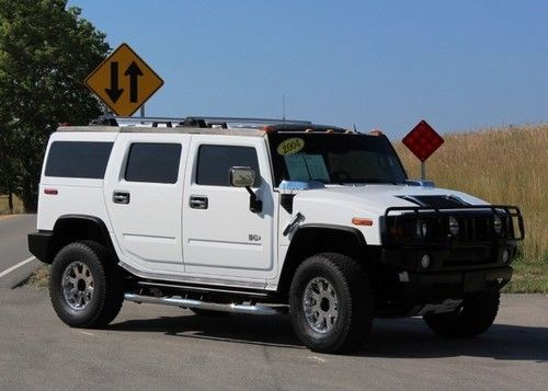 White and ready to go four wheel drive a/t a/c dvd 4x4 sunroof chrome wheels