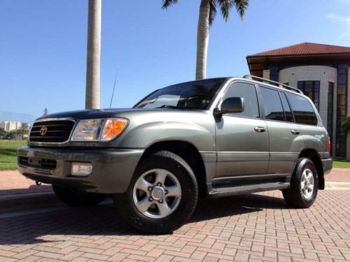 1999 toyota land cruiser 4wd 1 owner low miles heated leather seats third row