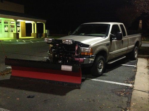 1999 ford f-250 7.2 diesel 248,000 miles with snow plow, saltspreader 5th wheel.