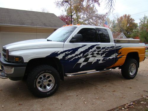 2500 qc leather laramie rebuilt tranny $5,000 custom paint lots of extras low mi