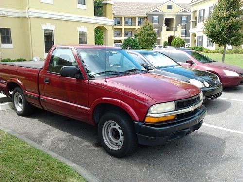 5 speed, single cab, burgundy, tonneau cover, ladder racks, 227k miles, runs grt