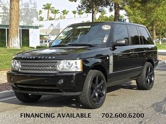 4x4 - navigation - dvd in headrests - back up camara - supercharged - financing!