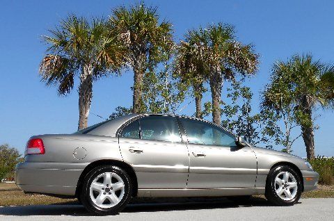 31k miles desert beige/tan leather~onstar~msrp $32k~goodyear eagles