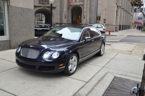 2006 bentley continental flying spur.  dark sapphire with saffron.